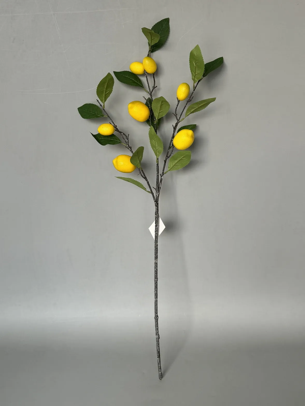 Цветок искусственный Ветка Лимон 85см, желтый по цене 